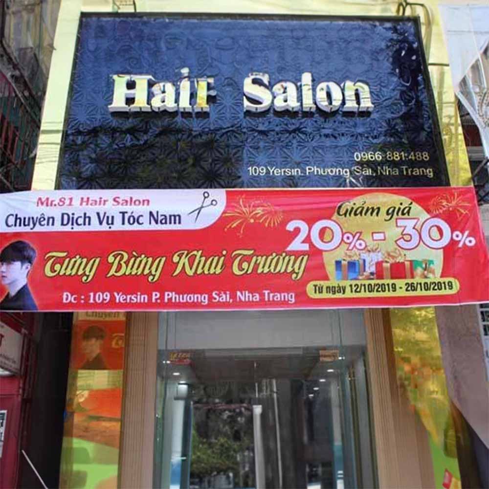 In băng rôn khai trương